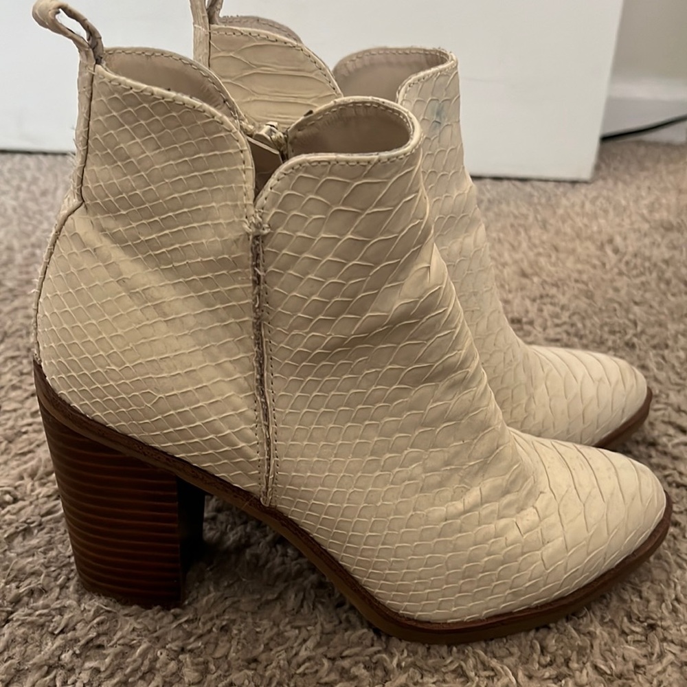 MIA booties. White. Used. Small denim stain on left shoe